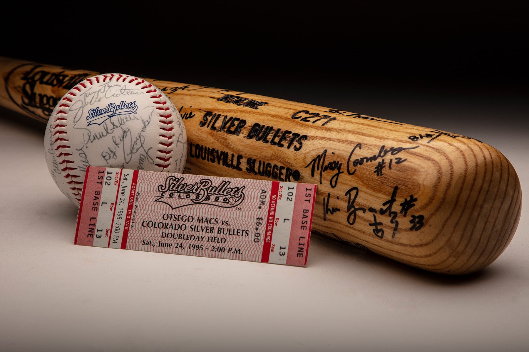 Colorado Silver Bullets bat, baseball and ticket