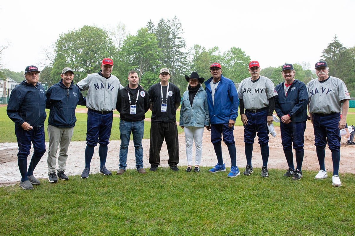 Tony La Russa, Josh Rawitch, Scott Rolen, Jane Forbes Clark, Fergie Jenkins, Rollie Fingers, Wade Boggs and Jack Morris with USS Cooperstown sailors