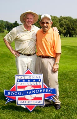 Whitey Ford (left) poses with former Yankees teammate and fellow Hall of Famer Yogi Berra at the Leatherstocking Golf Course during Hall of Fame Weekend 2005. (Milo Stewart Jr.  / National Baseball Hall of Fame and Museum) 