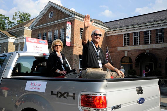 Al Kaline and his wife Louise smile and wave to the crowd at the 2011 <em>Parade of Legends</em> in Cooperstown during Hall of Fame Weekend. (Milo Stewart Jr. / National Baseball Hall of Fame and Museum) 