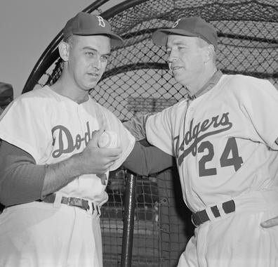Walter Alston, shown on right with Dodgers pitcher Clem Labine, managed Brooklyn and Los Angeles from 1954-76. (Osvaldo Salas/National Baseball Hall of Fame and Museum)