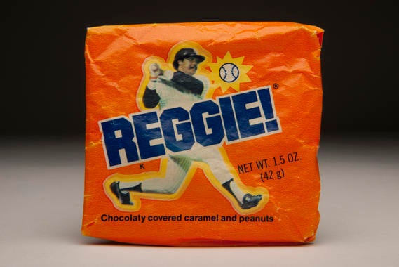 A Reggie! candy bar named after Hall of Famer Reggie Jackson. The caramel bar was first passed out at Yankee Stadium on Opening Day 1978. B-125-93-01 (Milo Stewart, Jr. / National Baseball Hall of Fame)