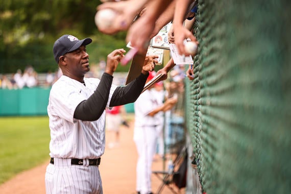 José Contreras signs autographs for fans at the May 28 Hall of Fame Classic in Cooperstown. (Parker Fish/National Baseball Hall of Fame and Museum)
