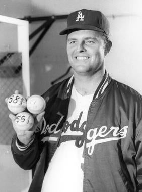 Los Angeles Dodgers pitcher Don Drysdale threw 58 and 2/3 consecutive scoreless innings during the summer of 1968 to eclipse the all-time record of 56 scoreless frames set by fellow Hall of Famer Walter Johnson in 1913. All three of the baseballs Drysdale holds in this picture are housed in the Hall of Fame collection. BL-1368-68 (National Baseball Hall of Fame Library)