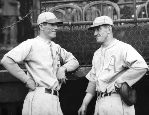 Lefty Grove (left) talks to fellow future-Hall of Famer Mickey Cochrane while they were teammates for the Philadelphia Athletics. (National Baseball Hall of Fame) 