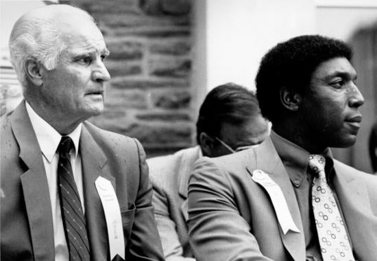 Hall of Fame inductees Bobby Doerr and Willie McCovey sit on the stage during the 1986 Hall of Fame Induction Ceremony in Cooperstown. BL-7953-94 (Tom Ryder / National Baseball Hall of Fame Library)
