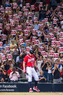 Atlanta Braves fans hold signs for Chipper Jones, No. 10 of the Atlanta Braves, as he bats against the New York Mets in his final series at Turner Field, on Sept. 28, 2012. (Pouya Dianat / Atlanta Braves)
