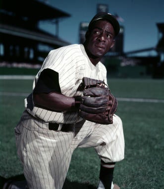 When he debuted with the Indians in 1949, Minnie Miñoso became the first acknowledged dark-skinned Latin player in AL/NL history. (Look Magazine/National Baseball Hall of Fame and Museum)