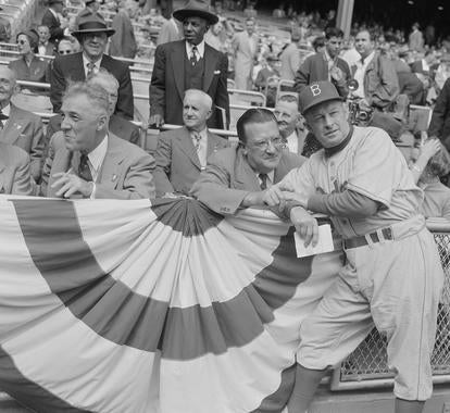 Dodgers owner Walter O'Malley, center, talks with manager Chuck Dressen with Ford Frick on the far left. (Osvaldo Salas/National Baseball Hall of Fame and Museum)