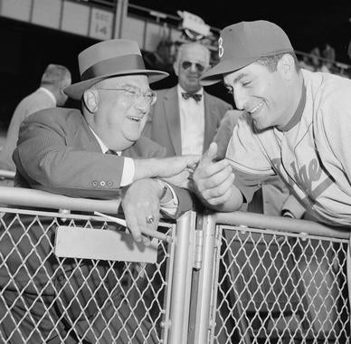 Dodgers owner Walter O'Malley chats with outfielder Carl Furillo. (Osvaldo Salas/National Baseball Hall of Fame and Museum)