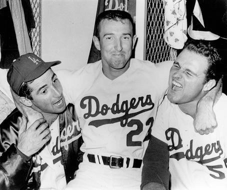 Claude Osteen (center) celebrates with Don Drysdale (right) and Sandy Koufax (left) after Sandy leads the Dodgers to a 7-0 victory over the Minnesota Twins in Game 5 of the 1965 World Series. (National Baseball Hall of Fame and Museum) 