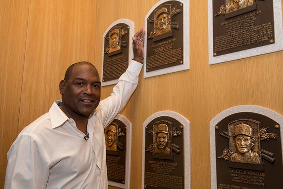 Tim Raines poses next to former Expos teammate Gary Carter's plaque at the Hall of Fame. (Milo Stewart Jr.  / National Baseball Hall of Fame and Museum) 