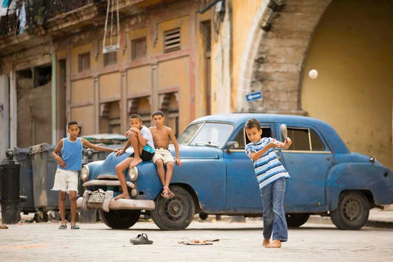 Young kids play a game of baseball on the streets of Old Havana on January 11, 2015 in Havana, Cuba. (Jean Fruth / National Baseball Hall of Fame)