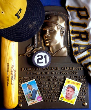 A collage of Roberto Clemente artifacts retained by the Museum & Library, along with his plaque. (Milo Stewart, Jr., National Baseball Hall of Fame Library) 