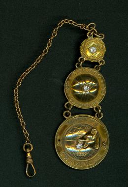 Gold fob chain pendant, with 3 club medallions issued to Mordecai Brown: 1908 World Championship, Chicago Champions of 1906, and 1907 World Championship. - B-506-52  (Milo Stewart Jr./National Baseball Hall of Fame Library)