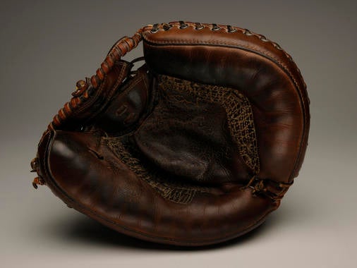 Catcher's mitt used by Yogi Berra catching a perfect game in the 1956 World Series - B-128.58  (Milo Stewart Jr./National Baseball Hall of Fame Library)
