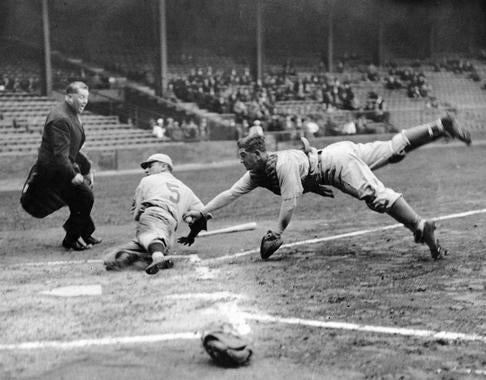 Athletics catcher Mickey Cochrane dives home and tags out Phillies base runner Pinky Whitney at Shibe Park, April 1, 1933 - BL-199-58b (National Baseball Hall of Fame Library)
