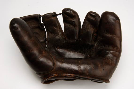 Glove used by Bobby Doerr of Red Sox in 1948 season; had 73 games, 414 chances without an error, a fielding record at the time - B-28-86  (Milo Stewart Jr./National Baseball Hall of Fame Library)