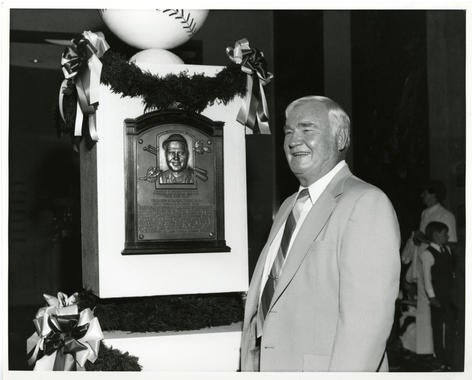 Hall of Famer Johnny Mize poses with his plaque during Hall of Fame Weekend 1981. (National Baseball Hall of Fame Library)