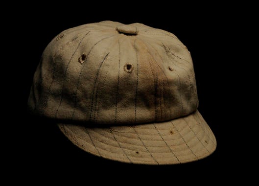 Red Sox cap worn by Harry Hooper with the Boston Red Sox, with holes in the brim to attach flip-down sunglasses - B-195-71 (Milo Stewart Jr./National Baseball Hall of Fame Library)