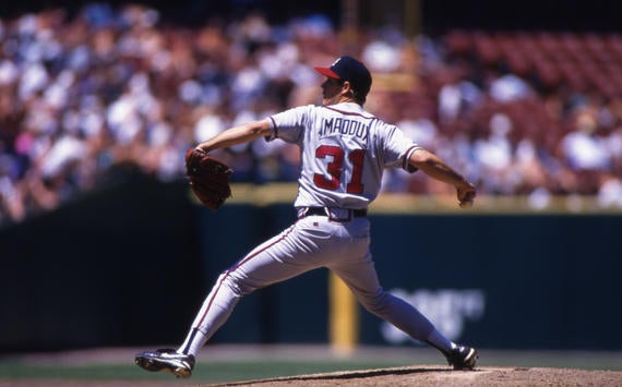 Atlanta Braves pitcher Greg Maddux pitching in game, 1995 - BL-1227 (Brad Mangin/National Baseball Hall of Fame Library)