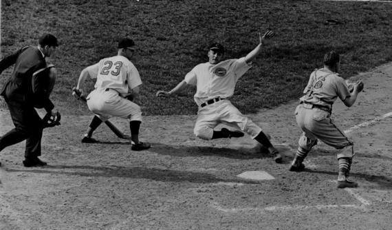 McCormick sliding into home plate against an unidentified team. BL-7157.70 (National Baseball Hall of Fame Library)