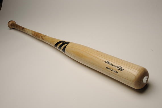 On May 5, 2004, Mets star Mike Piazza hit a solo home run with this bat for his 352nd home run as a catcher, breaking Carlton Fisk’s major league record. - B-261-2004 (Milo Stewart, Jr./National Baseball Hall of Fame)