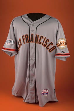 Buster Posey was behind the plate wearing this Giants road jersey when the club clinched Game Seven’s victory. The catcher is one of eight Giants to be on the active roster for all three of San Francisco’s World Series Championships: 2010, 2012, and 2014. Only Posey started every one of those clubs’ postseason games. - B-182-2014 (Milo Stewart, Jr./National Baseball Hall of Fame Library)