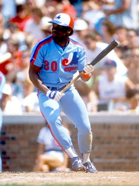 Tim Raines of the Montreal Expos attempts to bunt during an MLB game versus the Chicago Cubs at Wrigley Field in Chicago, Illinois. - BL-010813 (Ron Vesely/National Baseball Hall of Fame Library)