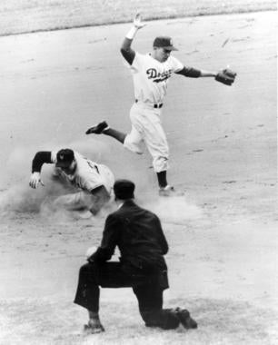Pee Wee Reese of the Brooklyn Dodgers completing a play at second base. - BL-5812-98 (National Baseball Hall of Fame Library)