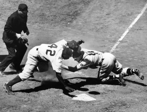 Jackie Robinson tagged out at plate by the Pirates' Clyde McCullough at Ebbets Field on May 2, 1951. Robinson Jackie 5613-73_ACT_NBL Sisto (Ernie Sisto/National Baseball Hall of Fame Library)