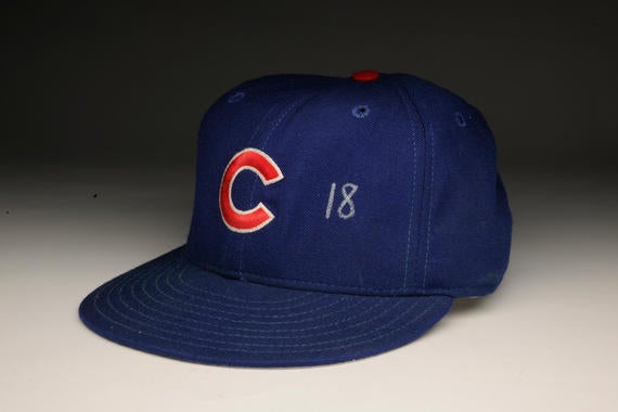 Chicago Cubs uniform cap worn by Sammy Sosa during the 1999 season.  Sosa became the first player in history to record 60+ home runs in two seasons. B-368.99 (Milo Stewart, Jr. / National Baseball Hall of Fame)