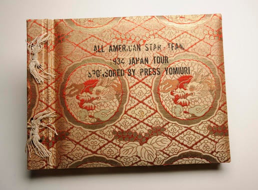 Cover of the photograph album presented to participants in the 1934 American baseball tour to Japan by the tour’s sponsor, the Yomiuri newspaper. - B-277-51 (Milo Stewart, Jr./National Baseball Hall of Fame Library)