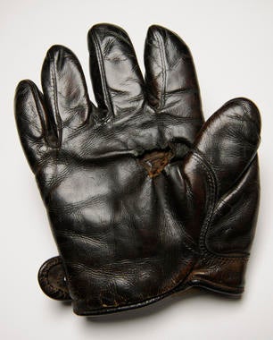 Glove used by Rube Waddell of Philadelphia Athletics when he faced Cy Young at Boston on July 4th, 1905. Both pitchers went all 20 innings with Waddell winning 4-2 - B-33-42 (Milo Stewart Jr./National Baseball Hall of Fame)