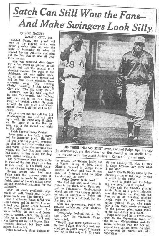 1952: St Louis Browns pitcher, Satchel Paige chats with teammates