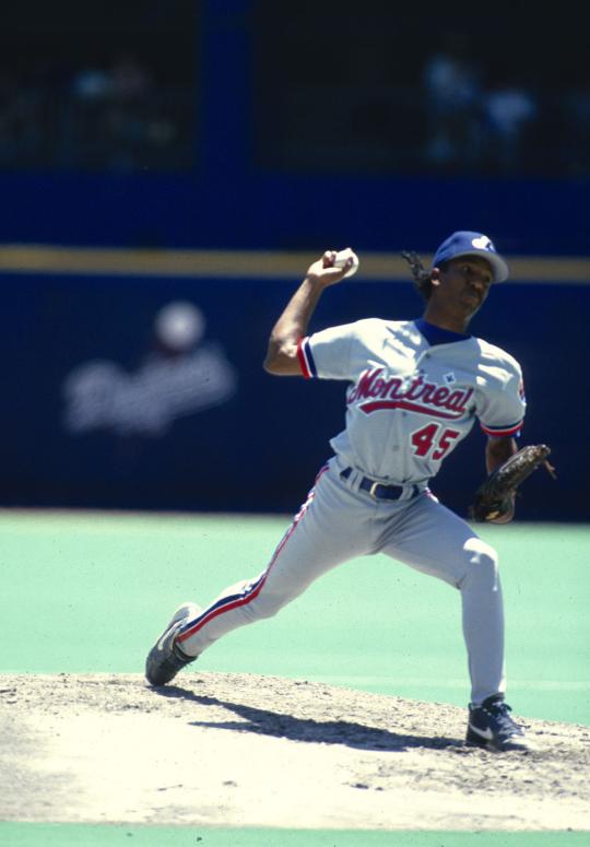 SI Vault on X: Pedro Martinez hangs out in the Expos dugout before a July  1995 game:  / X